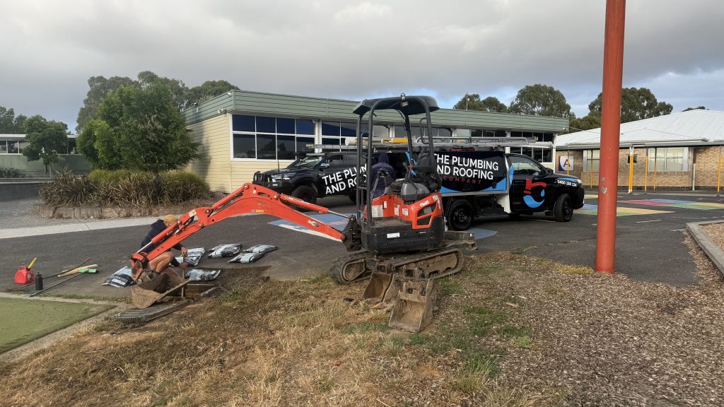 Excavator on site for a drainage and excavation job
