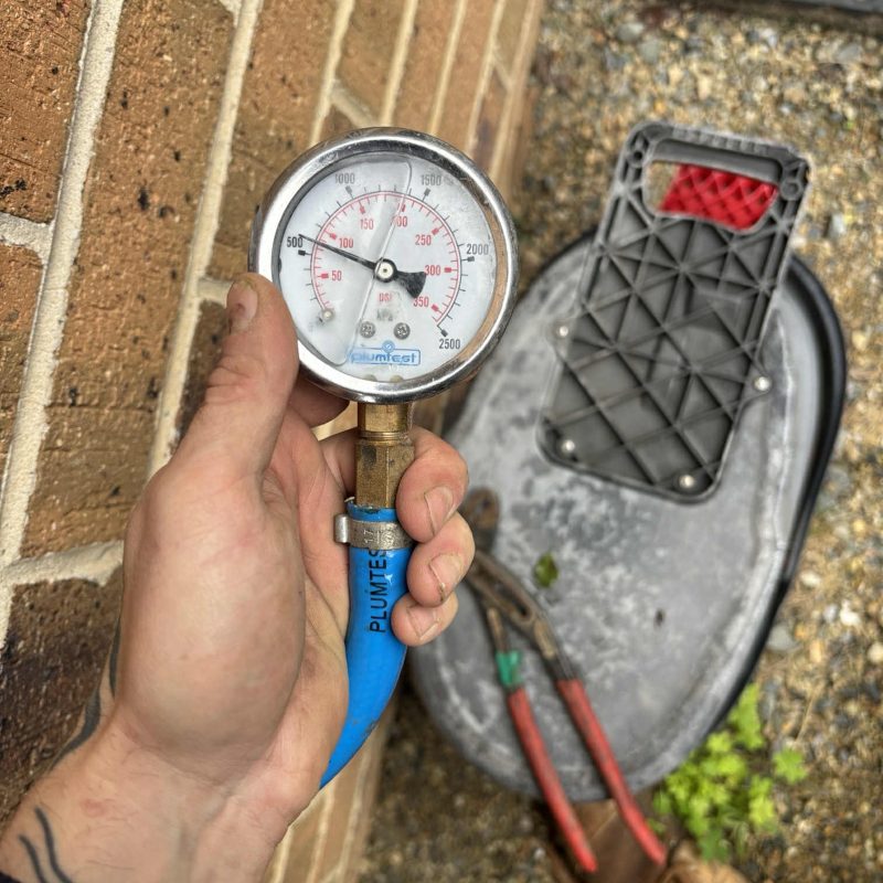 Pressure gauge used during a plumbing test