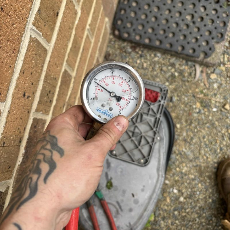 Pressure testing a plumbing system