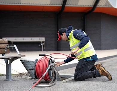 High pressure jetting to clear a blocked drain